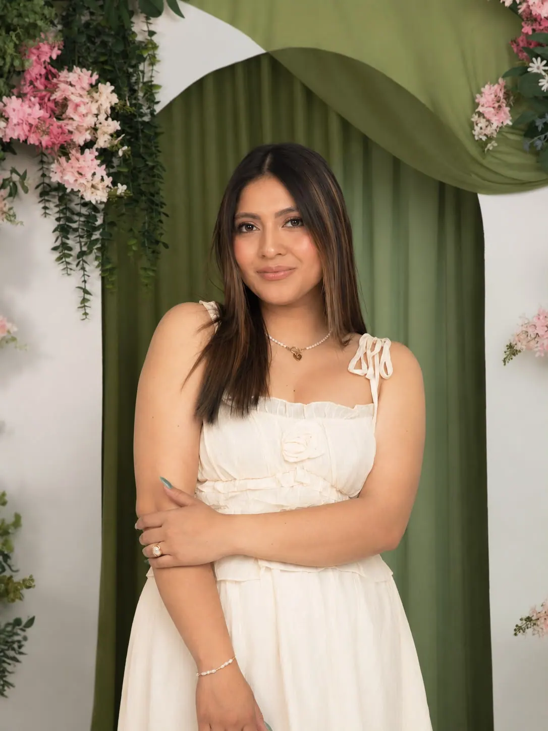 Bridal makeup portrait with a soft luminous complexion and a veil